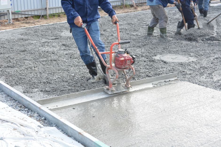 New concrete driveway being poured